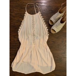 Light pink romper with crochet detail